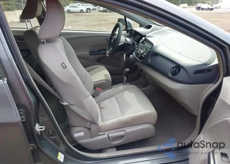 2010 Honda Insight Lx z USA, uszkodzony, nr VIN JHMZE2H50AS042743